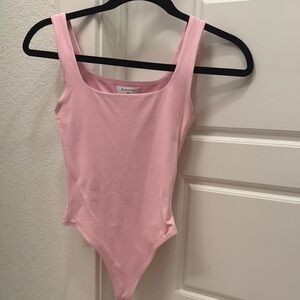 Babaton Pink Bodysuit Top with Scoop Neck and Stretchy Fit